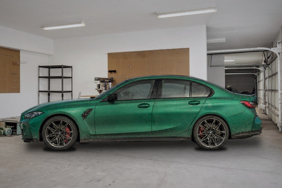 BMW couverte de saleté dans un garage, avant le passage de DB Autodetailing